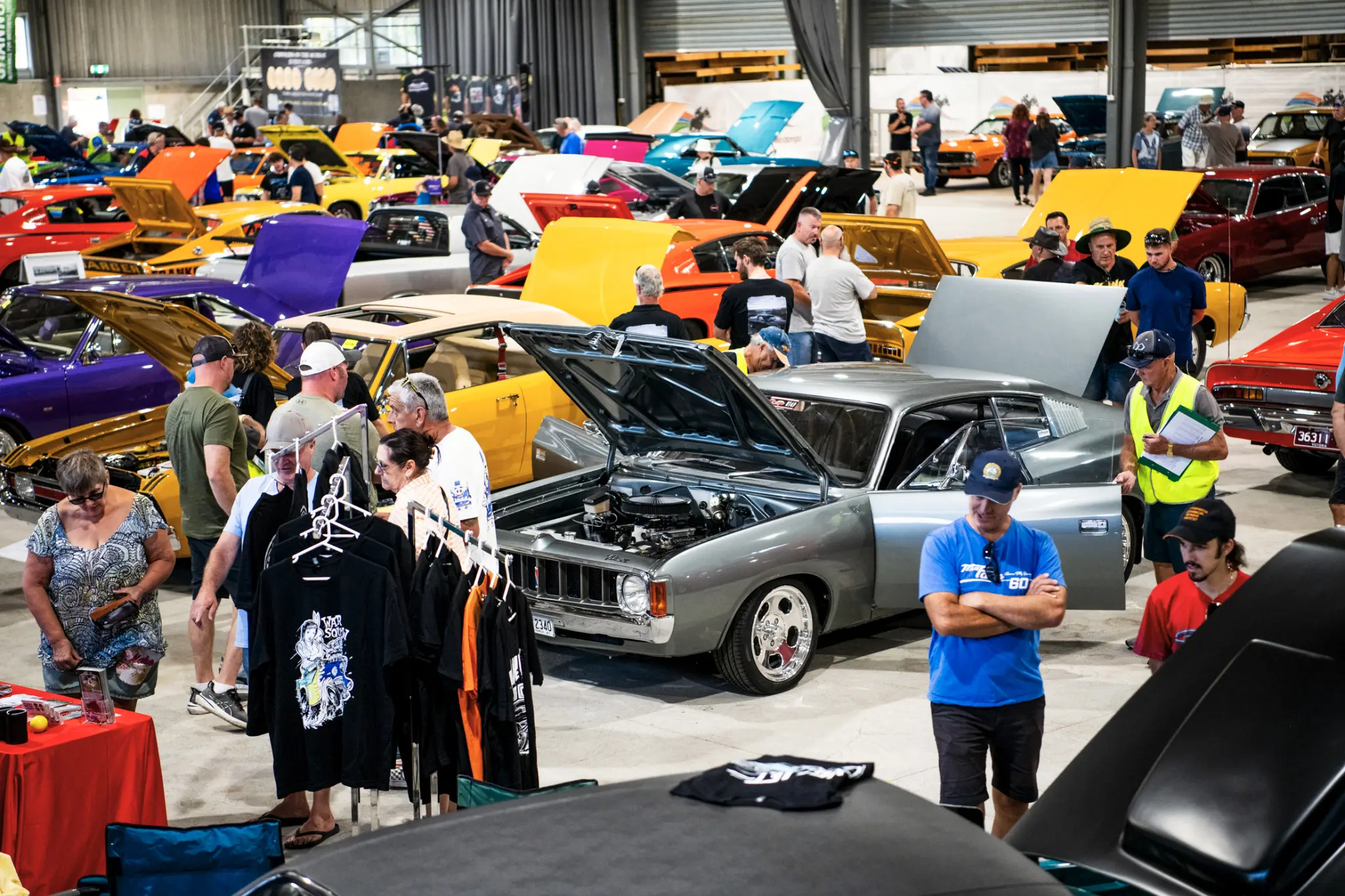 Visitors, judges and display cars inside the Chryslers on the Murray pavilion