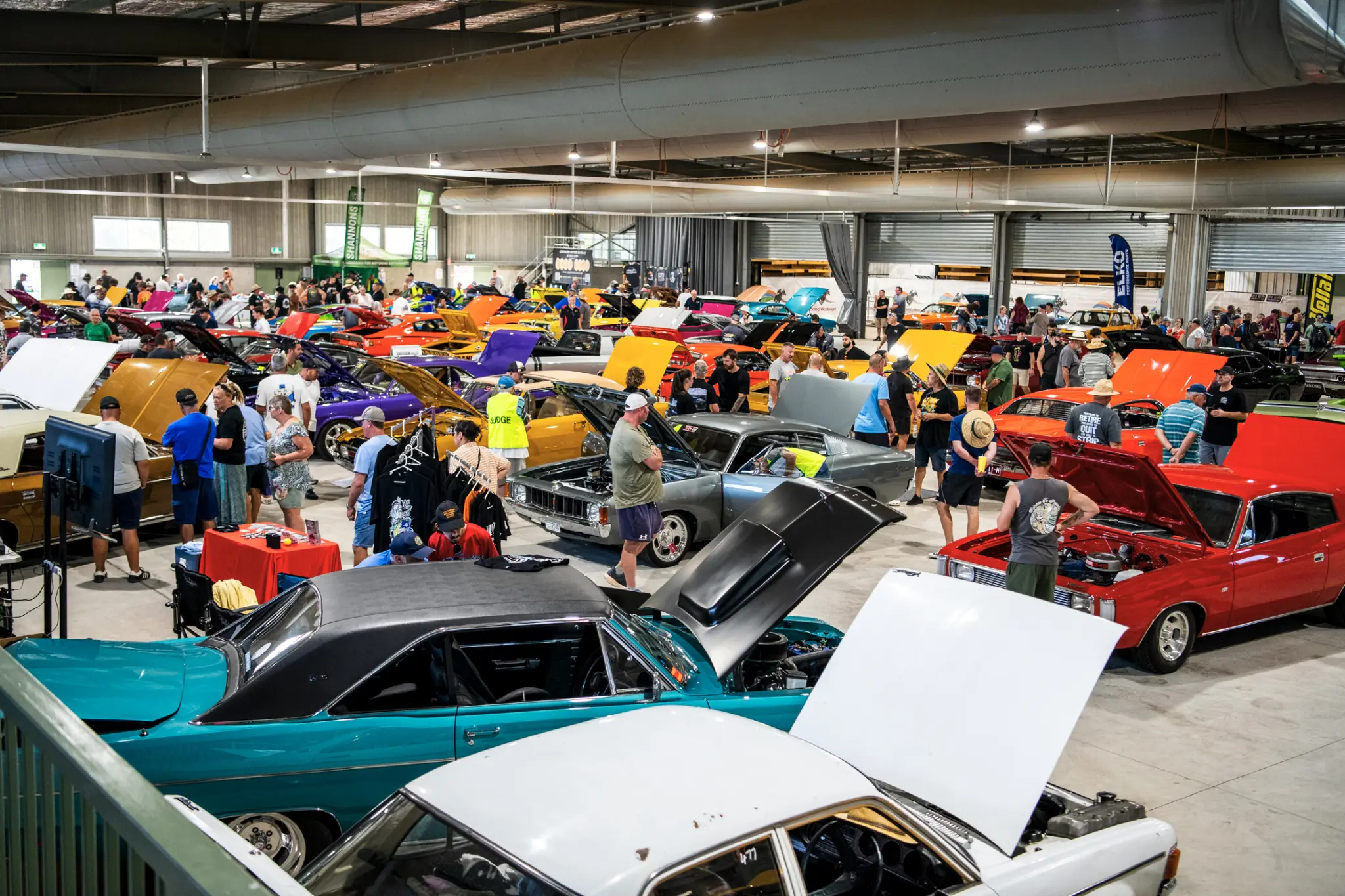 A packed Chryslers on the Murray indoor pavilion filled with display cars and visitors