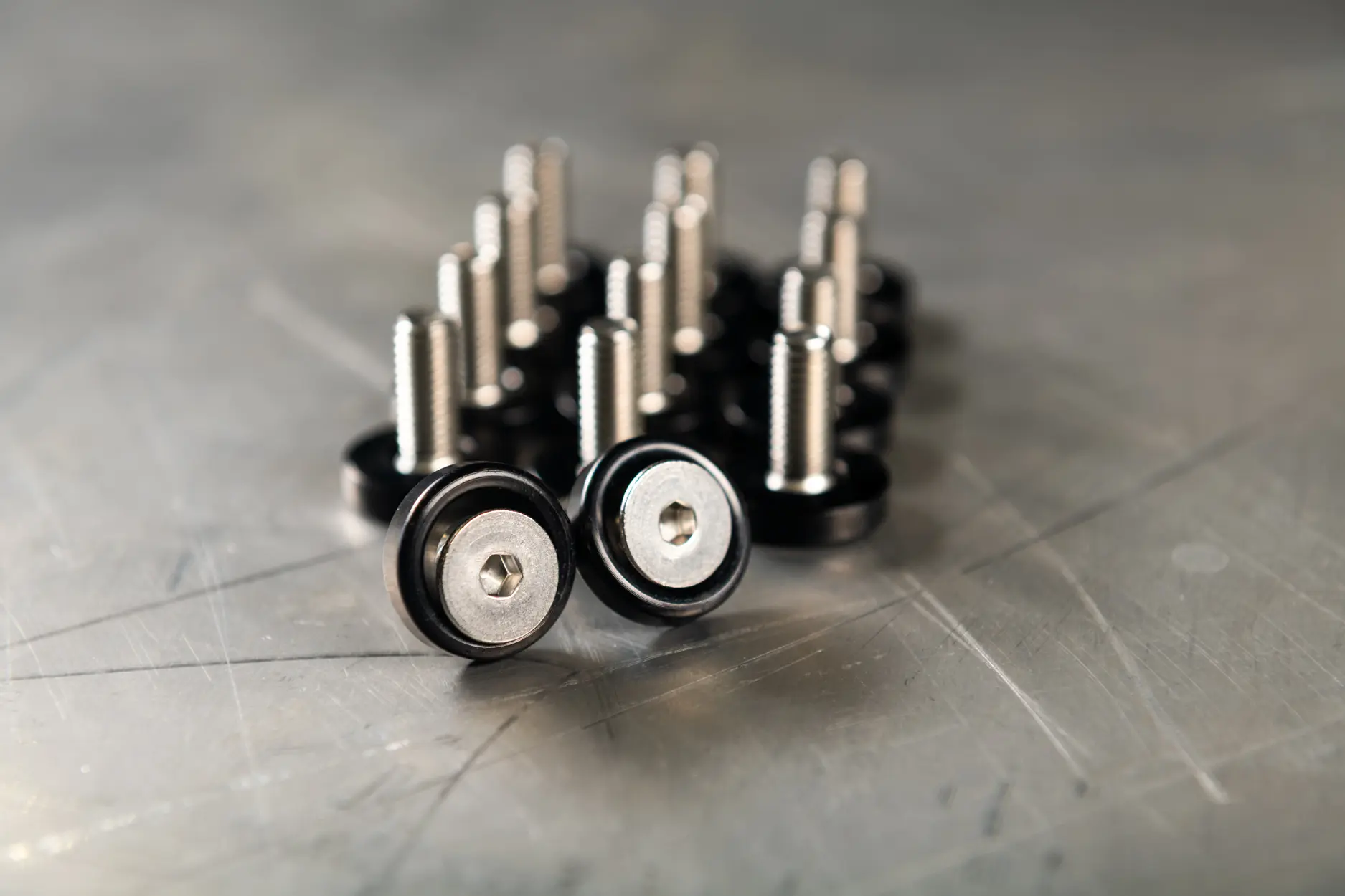 Machined fasteners photographed with shallow depth of field