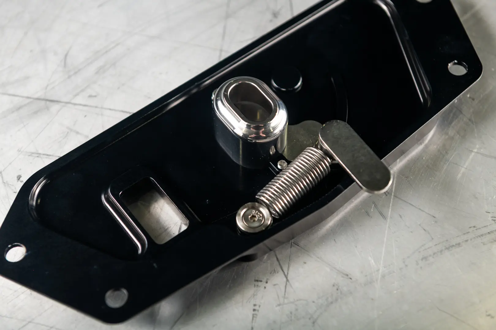 Close-up of a machined automotive latch assembly