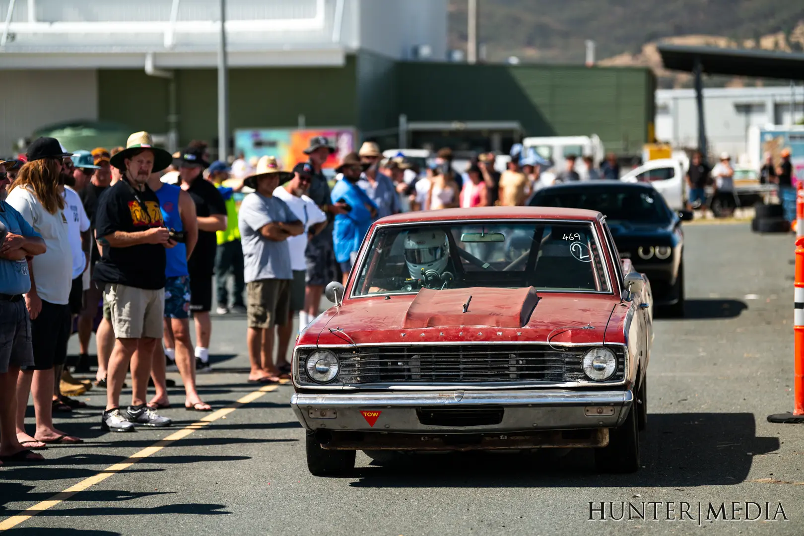 Valiant preparing for an action run in front of spectators at Chryslers on the Murray