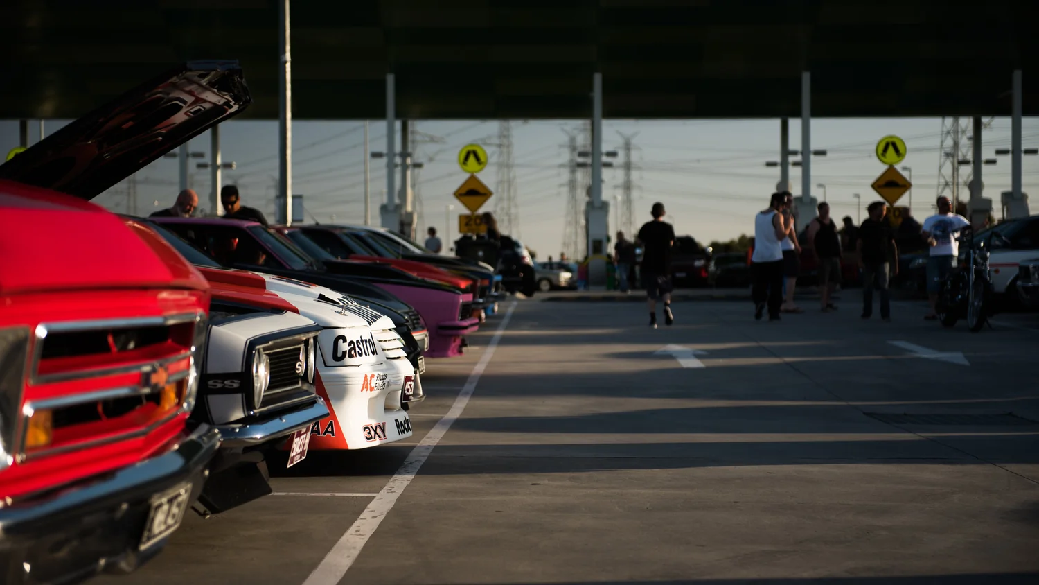 A line of performance cars at an automotive event