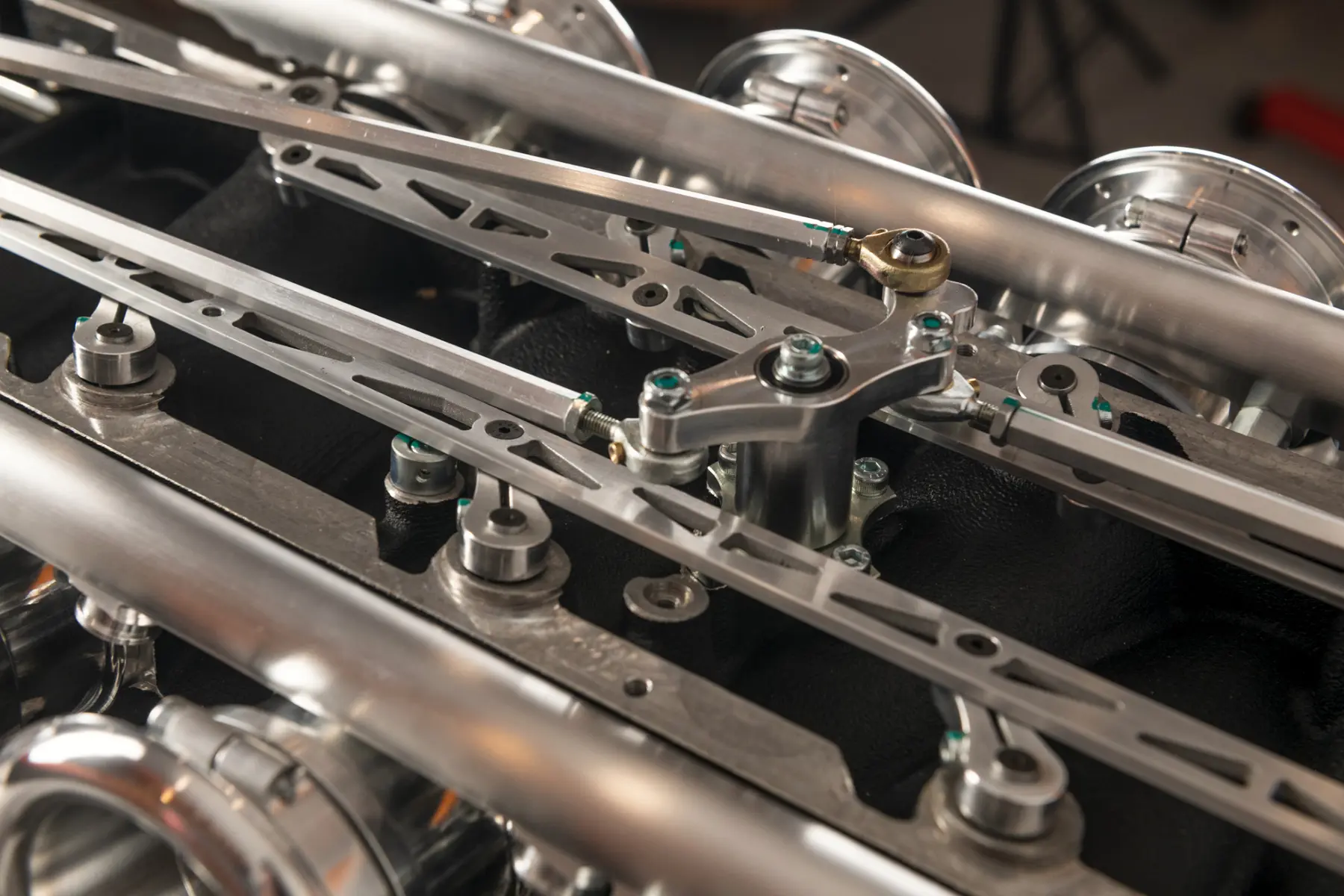 Close-up of precision throttle linkage on a performance engine